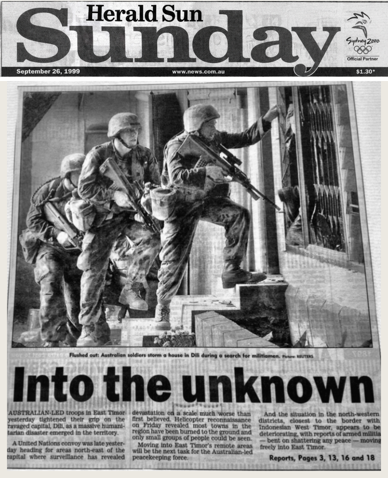 Herald Sun front page, September 26 1999 — Australian soldiers storming a house in Dili, under the headline Into the Unknown