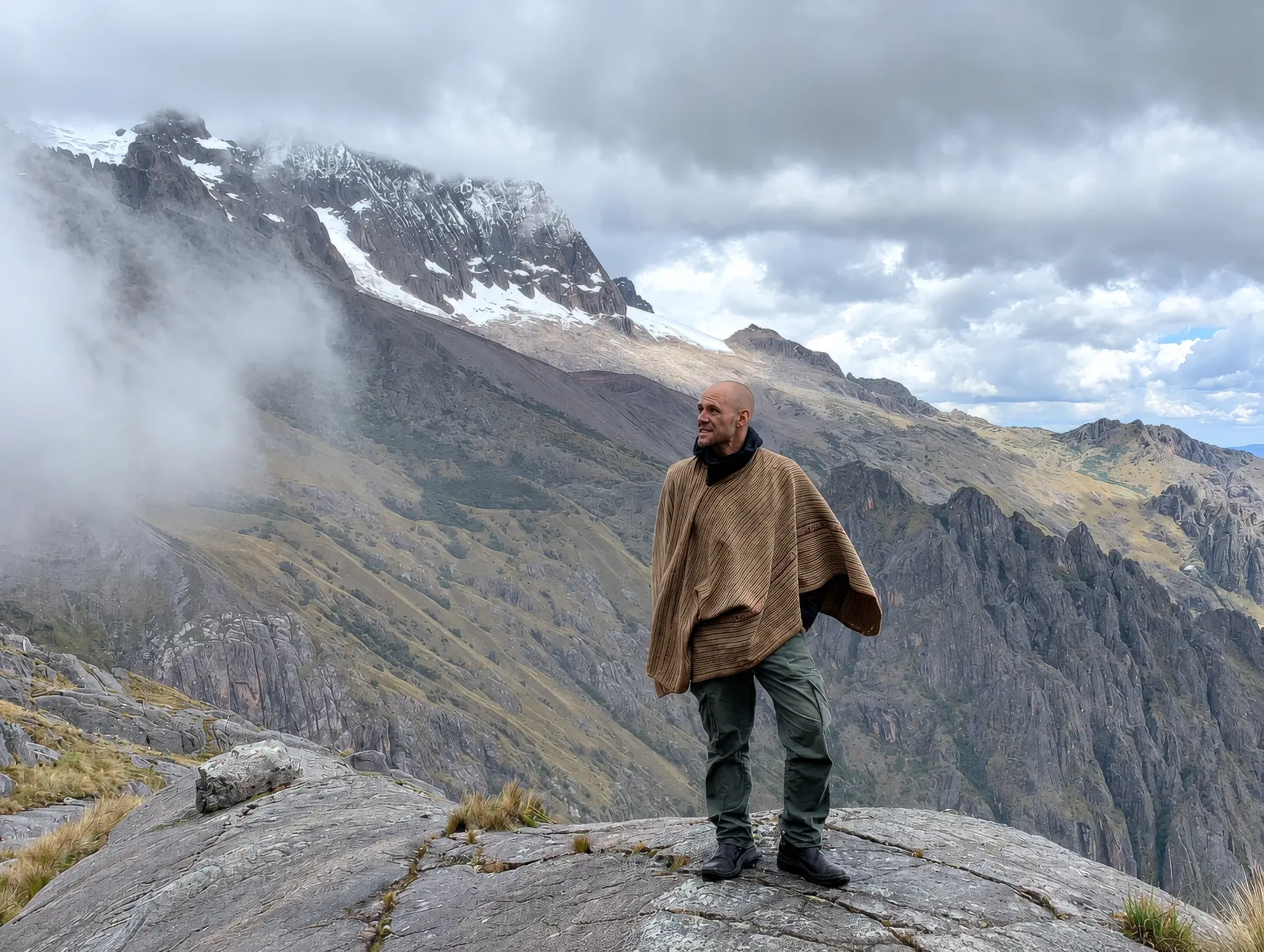 Jesse Kirley standing high in the mountains of Peru